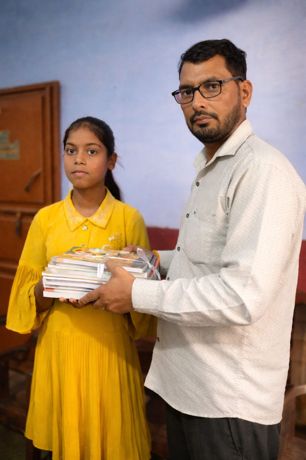 A smiling girl supported by BJSF education initiatives