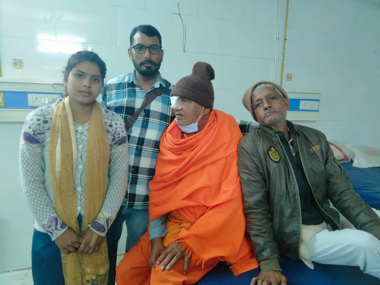 BJSF team assisting an elderly patient in the hospital